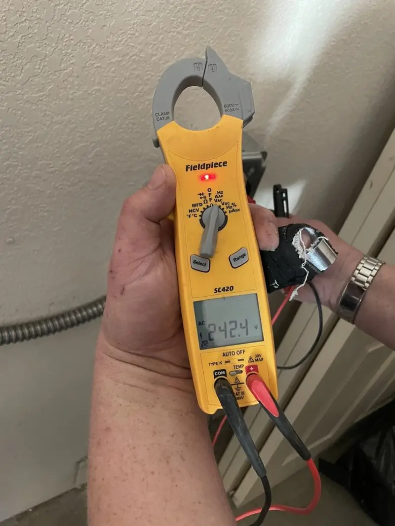 Voltage testing with clamp meter during Electrical Installation Services in Carolina Forest